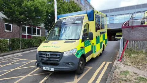 Ambulance driving out of hospital