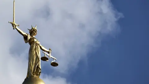 Getty Images Scales of justice