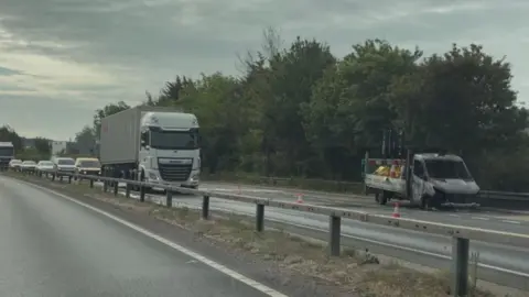 Burnt out traffic management vehicle on the A14.