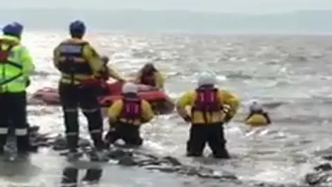 Wirral Coastguard Rescue Team Rescue of people stranded