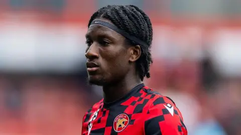 Stockport County player Jid Okeke, playing on loan for Walsall