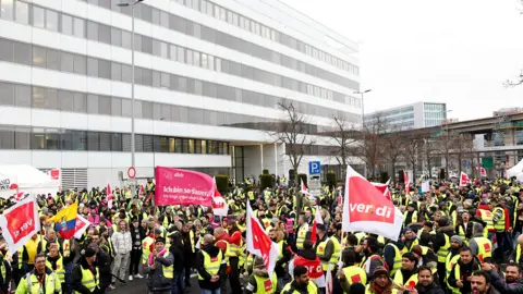 Reuters Workers strike in Frankfurt