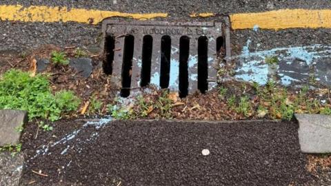 Paint on a drain in Bedford 