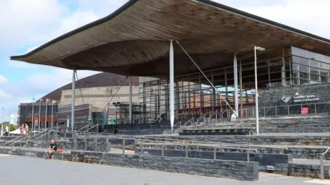 PA Media The Senedd building