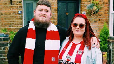 Harvey Parsons/Brentford FC Two Brentford fans in kit