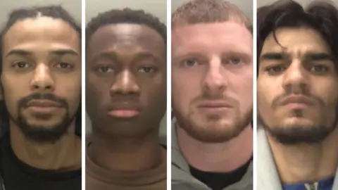 A composite of the mugshots of four men. From left to right is: a man with long dark hair and a beard, wearing a dark shirt; a man with short dark hair and a brown shirt, a man with short brown hair, a beared and a black shirt with a grey hooded-top; and a man with mid-length dark hair, a blue shirt and white top.