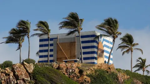 Reuters A boarded-up property on Jeffrey Epstein's island Little St James