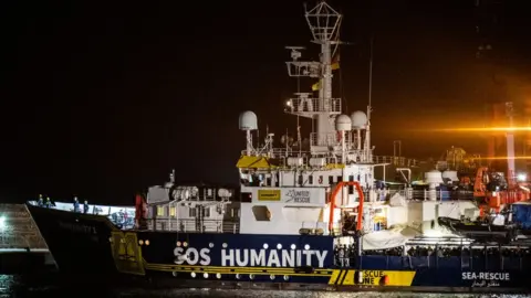 Getty Images Humanity 1 pulling into the port of Catania