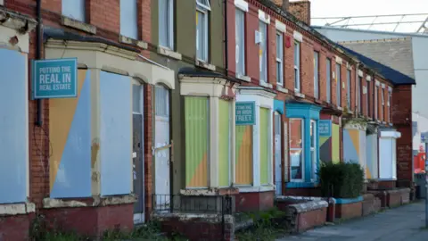 Houses next to Homebaked bakery in Liverpool