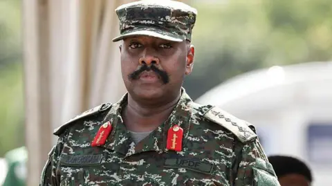Gen Muhoozi Kainerugaba, Uganda's Chief of Defence Forces in military jungle uniform
