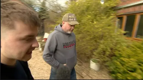 BBC reporter confronts director of landscaping company