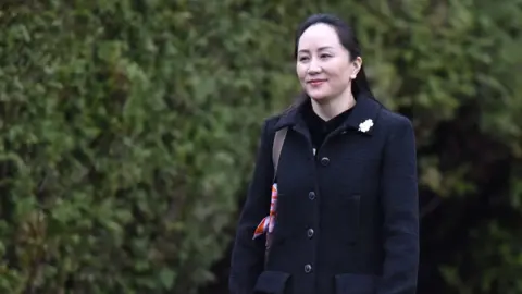 AFP Meng Wanzhou leaves her Vancouver home on Monday