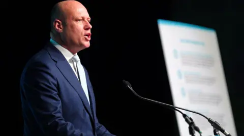 PA Media Reform UK leader in Wales Dan Thomas at the Reform UK manifesto launch for the Senedd elections in May, at the International Convention Centre Wales in Newport. 