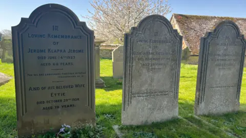 The grave of Jerome K Jerome in the churchyard of St Mary's in Ewelme. Next to his are the gravestones of his stepdaughter Else and his sister Blandina.