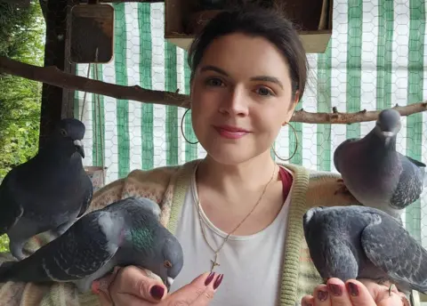 Hannah Hall Hannah with five pigeons