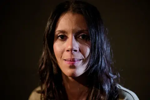 Laurence Cawley/BBC Portrait of Nadine Buzzard-Quashie, lit from both the left and by a catchlight on her hair