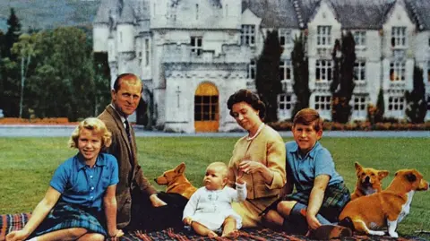 Getty Images Queen Elizabeth II with the Duke of Edinburgh and their children at Balmoral Castle.