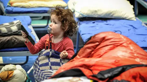 EPA A small boy from Mariupol in a centre for refugees in Taganrog, Russia, 21 March 2022