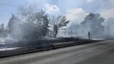 Helen Renouf Firefighter at the site trying to damp down the fire