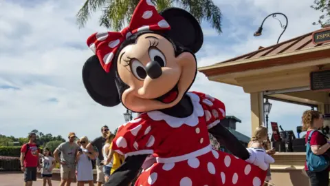 Getty Images Minnie Mouse poses for the camera at EPCOT