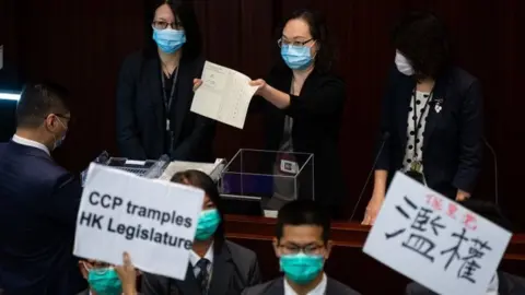 EPA A clerk counting ballots during the eventual vote