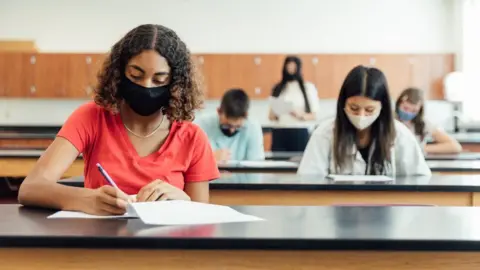 Getty Images Students sitting exams