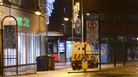 Pacemaker A Police Land Rover in a deserted Belfast city centre