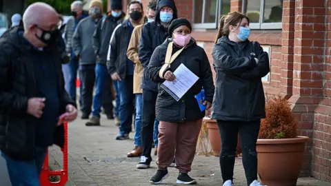 Getty Images Booster shot queue in Glasgow