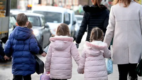 PA Media Children and adult