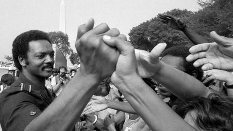 Jackson shaking hands at the March on Washington