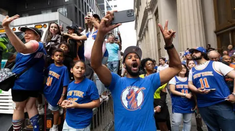 Getty Images excited Knicks fan cheering