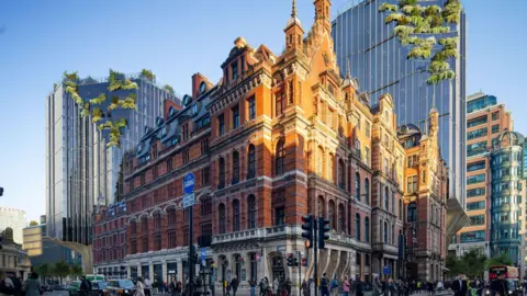 Liverpool Street station, a large, red brick, Victorian building, with glass fronted skyscrapers in the background