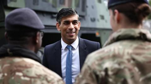 Prime Minister Rishi Sunak speaks with soldiers of various British troops as he visits the Julius Leber Barracks in Berlin to meet troops and see military equipment during his visit to Germany. Picture date: Wednesday April 24, 2024
