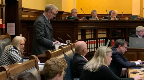 BBC Alex Allinson delivers his budget in Tynwald