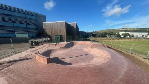 Turner Schools A skatepark on a sunny day.