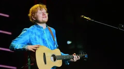 AFP British vocalist  and songwriter Ed Sheeran performs during a performance  successful  Mumbai connected  November 19, 2017. 