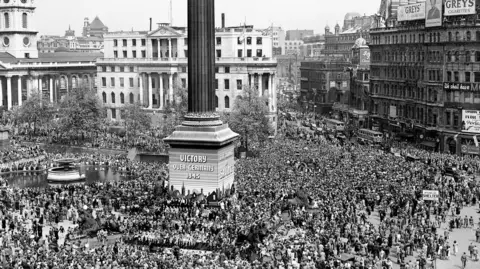 08/05/1945 of huge crowds at Trafalgar Square celebrate VE- Day in London on May 8th 1945