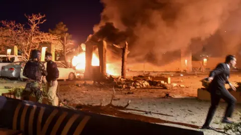 Reuters Flames at smoke during the explosion at the Serena Hotel