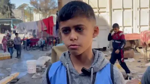 Abed Hussein who has been orphaned by the war