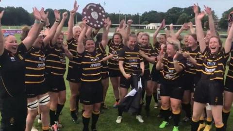 Cornwall celebrate winning the 2022 Gill Burns Cup division three title 