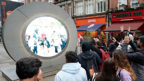 People looking at the portal in Dublin