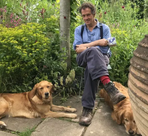 BBC Monty Don with dogs Nellie and Nigel