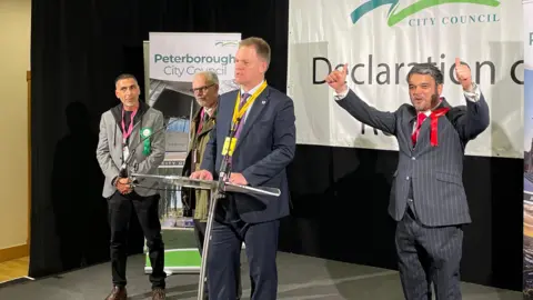 Ben Schofield/BBC Labour candidate celebrates win in Peterborough.