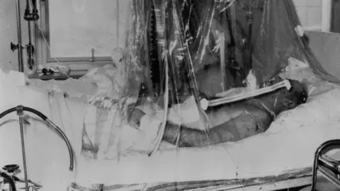 Getty Images Matt Busby fights for his life in a Munich hospital bed in 1958