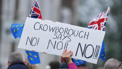 Eddie Mitchell A sign saying "Crowborough says No! No!! No!!!" with flags attatched to the sign