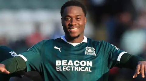 Owen Oseni celebrates scoring a goal