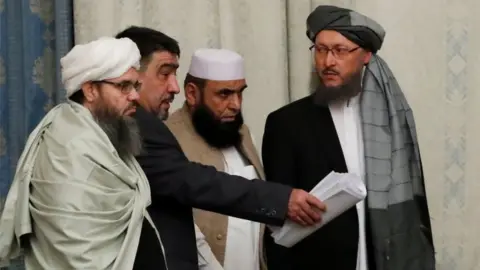 Reuters Members of Taliban delegation take their seats during the multilateral peace talks on Afghanistan in Moscow, Russia November 9, 2018.