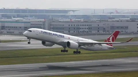 A Turkish Airlines plane landing 