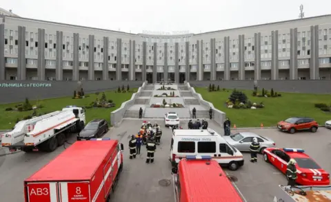 Reuters Firefighters at St George Hospital, 12 May 20