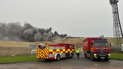 Fire engines at the scene of a fire at the landfill site in Hartlepool